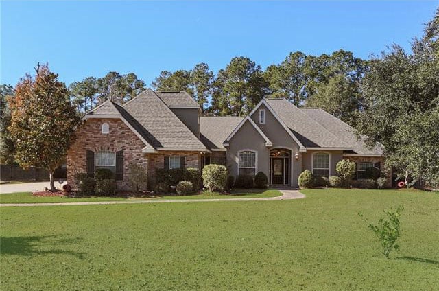 Custom Slidell home on over 1 acre with separate workshop